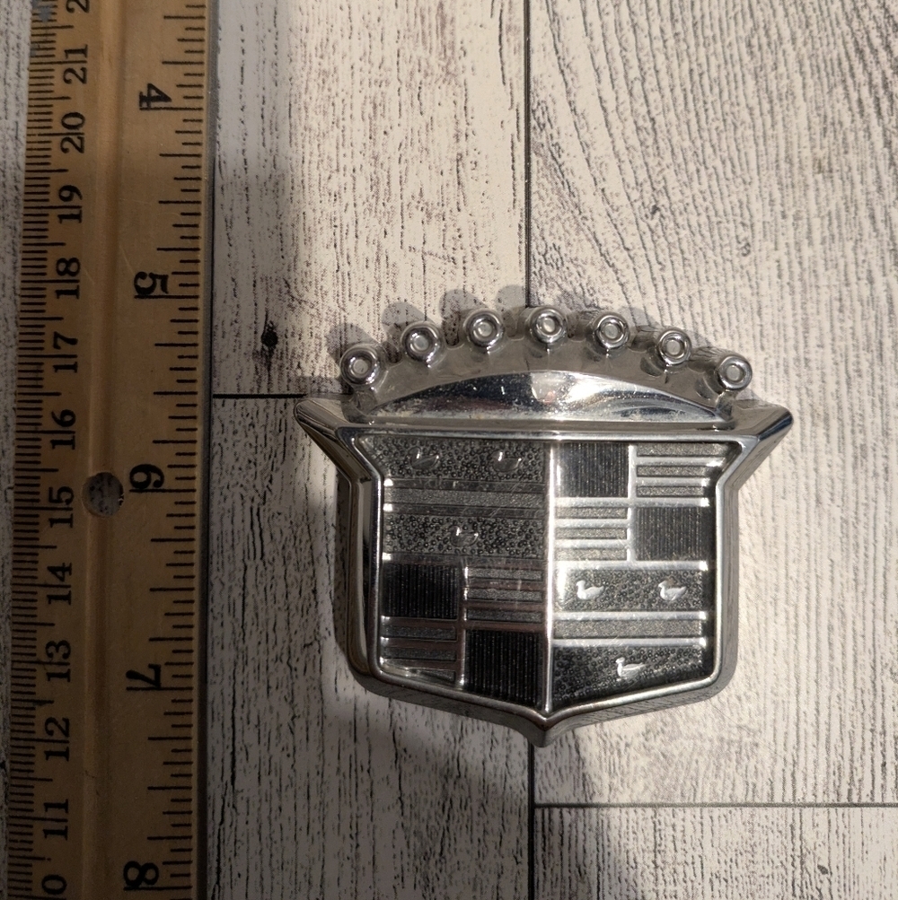 Silver Emblem with Crown Design